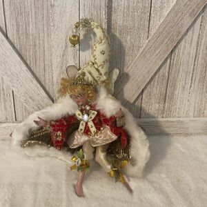 Mark Robert’s Elegant Holiday Fairy Figurine with Gold and Red Accents